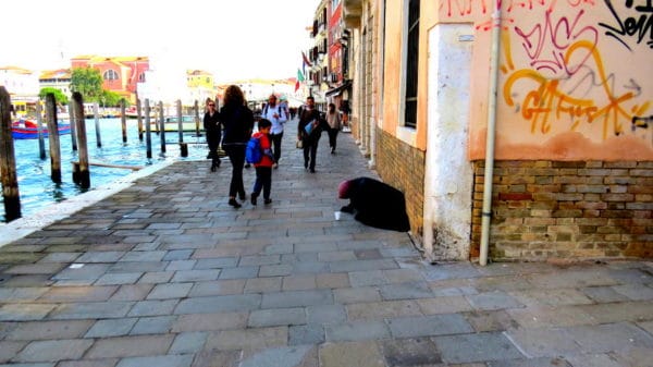 Beggars - An old woman begging in Venice