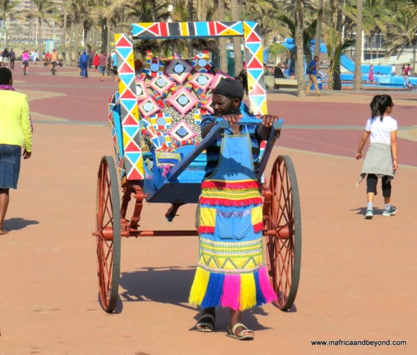 Colourful rickshaw with driver in Durban