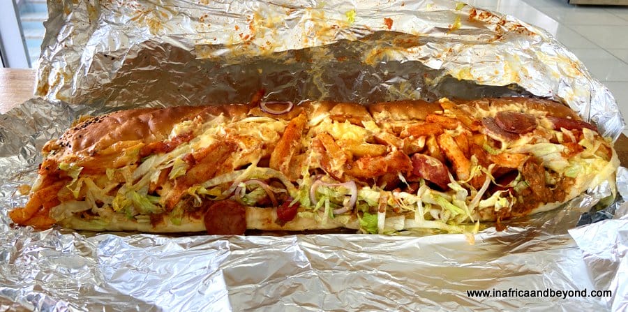 Gatsby from Industry Bakery - roll stuffed with meat, chips and salad