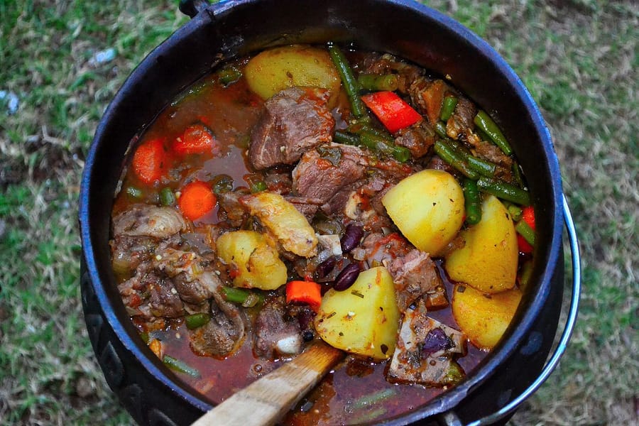Potjie kos - meat and vegetables cooked in a cast iron pot