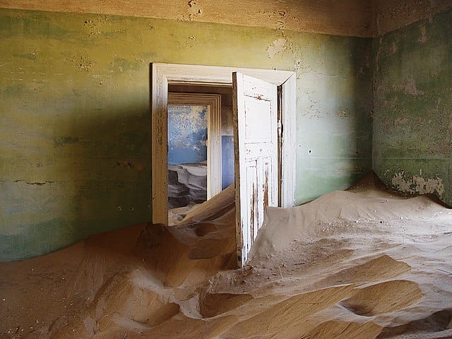 room filled with sand in Kolmanskop