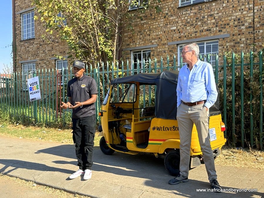 Exploring Soweto with Intrepid Travel 7 Darrell Wade looks on as Phil talks to us