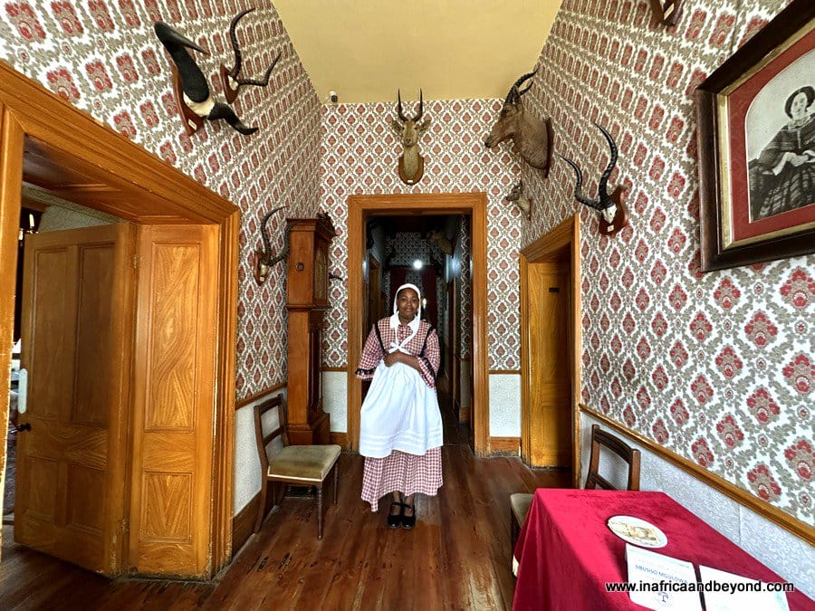 Hostess in period costume in museum