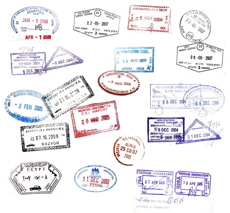 Dual Citizenship: The Key to Seamless International Travel Advantages 1 Various visa stamps from passports - dual citizenship