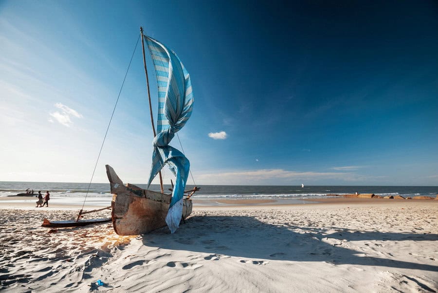 Traditional Malagasy sail boat on the sea coast